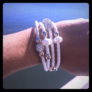NWOT White and gold braided bracelet.